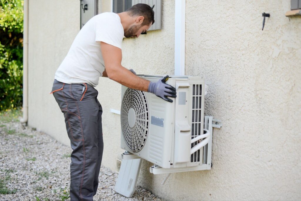 An air conditioner being installed.